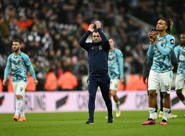 Nathan Jones, Manager of Southampton, and Sekou Mara of Southampton applaud the fans following their defeat in the Carabao Cup Semi Final 2nd Leg match between Newcastle United and Southampton at St James' Park on January 31, 2023 in Newcastle upon Tyne, England. (Photo by Gareth Copley/Getty Images)