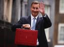 Chancellor Jeremy Hunt leaves Downing Street to present his spring budget to parliament. He is doing nothing to help our community, says Kate.