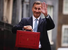 Chancellor Jeremy Hunt leaves Downing Street to present his spring budget to parliament. He is doing nothing to help our community, says Kate.
