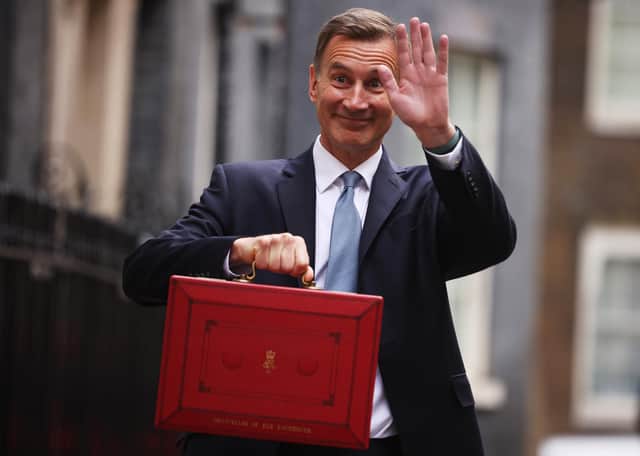 Chancellor Jeremy Hunt leaves Downing Street to present his spring budget to parliament. He is doing nothing to help our community, says Kate.