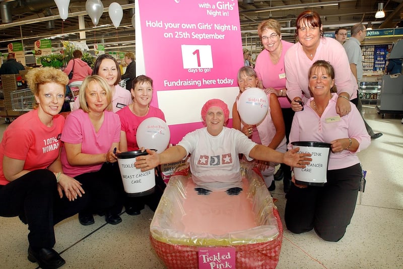 Staff at Asda in Peterlee dressed in pink and bathed in gunge of the same colour in this 2004 fundraiser. Remember it?