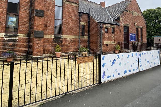 The wall of remembrance on the railings outside of West Harton Methodist Church.