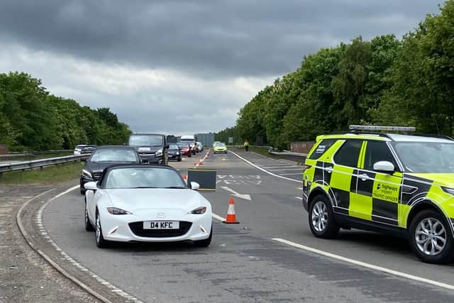 A lane remained closed to traffic for a time after the collision as the area was cleared of debris.