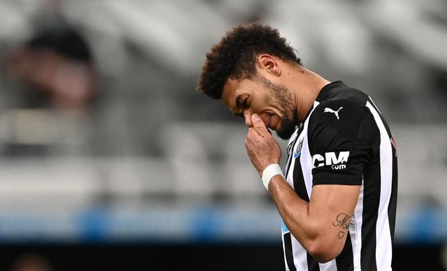 NEWCASTLE UPON TYNE, ENGLAND - FEBRUARY 27: Newcastle striker Joelinton reacts after a chance goes begging during the Premier League match between Newcastle United and Wolverhampton Wanderers at St. James Park on February 27, 2021 in Newcastle upon Tyne, England. Sporting stadiums around the UK remain under strict restrictions due to the Coronavirus Pandemic as Government social distancing laws prohibit fans inside venues resulting in games being played behind closed doors. (Photo by Stu Forster/Getty Images)