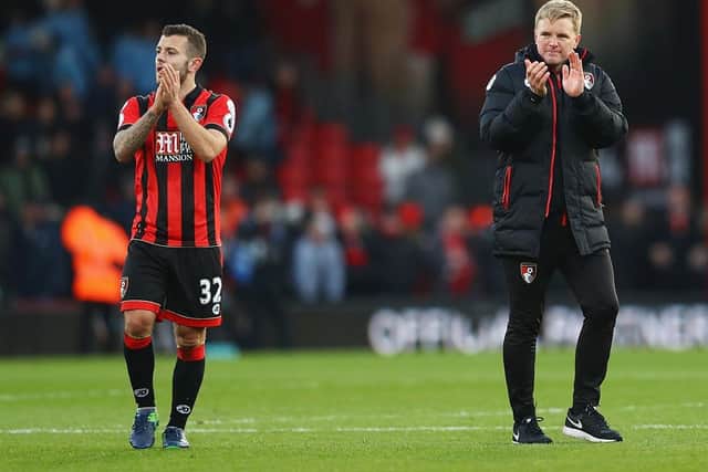 BOURNEMOUTH, ENGLAND - DECEMBER 04:  Eddie Howe manager of AFC Bournemouth celebrates victory with Jack Wilshere of AFC Bournemouth after the Premier League match between AFC Bournemouth and Liverpool at Vitality Stadium on December 4, 2016 in Bournemouth, England.  (Photo by Michael Steele/Getty Images)
