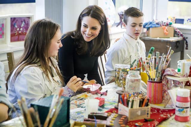 Kate brushes up on her airbrushing technique at an art class...