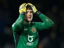 LONDON, ENGLAND - FEBRUARY 26: Freddie Woodman of Swansea City reacts to conceding his sides first goal during the Sky Bet Championship match between Fulham and Swansea City at Craven Cottage on February 26, 2020 in London, England. (Photo by Jordan Mansfield/Getty Images)