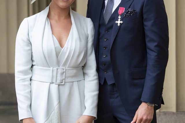 England captain Harry Kane, with his partner Kate Goodland, after being made an MBE at Buckingham Palace, London.