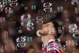 Declan Rice of West Ham walks through bubbles during the Premier League match between West Ham United and Newcastle United at London Stadium on April 05, 2023 in London, England. (Photo by Alex Pantling/Getty Images)