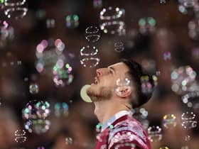 Declan Rice of West Ham walks through bubbles during the Premier League match between West Ham United and Newcastle United at London Stadium on April 05, 2023 in London, England. (Photo by Alex Pantling/Getty Images)