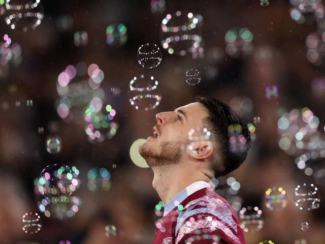 Declan Rice of West Ham walks through bubbles during the Premier League match between West Ham United and Newcastle United at London Stadium on April 05, 2023 in London, England. (Photo by Alex Pantling/Getty Images)