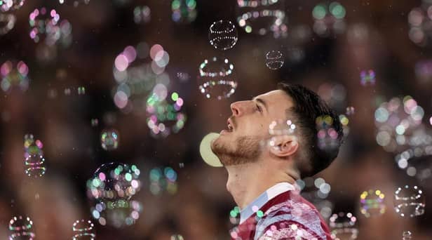 Declan Rice of West Ham walks through bubbles during the Premier League match between West Ham United and Newcastle United at London Stadium on April 05, 2023 in London, England. (Photo by Alex Pantling/Getty Images)
