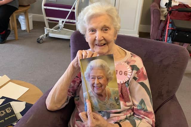 Sheila Cork with her letter from the Queen on her 106th birthday