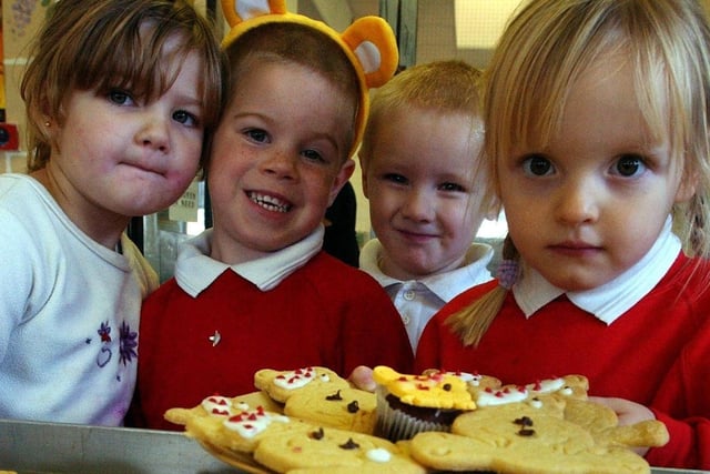 Happy times at Harton Nursery, where children were pictured with Pudsey Bear biscuits and cakes made by the kitchen staff in 2003.