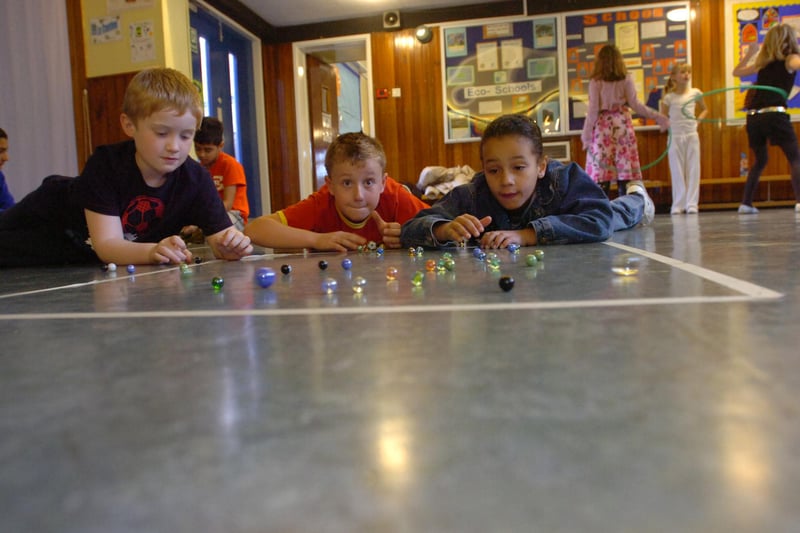 Having a game of marbles at St. Bede's RC Primary School, Washington were, left to right, Andrew McDonnell, Kristian Marcess and Kiyana Musonda in 2009. Marbles was also a favourite childhood game for Wearside Echoes follower Sharon Cleminson.