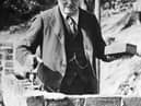 Winston Churchill carrying out some brick work at his home in Chartwell, Kent, in 1928 (photo: Getty Images)