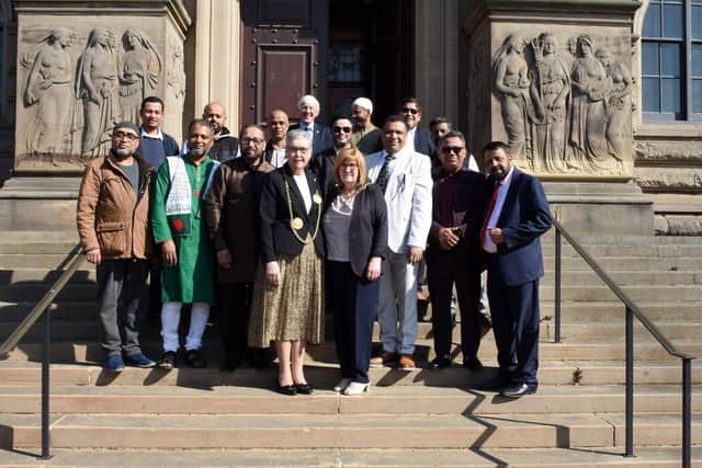 On the Town Hall steps.