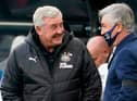 Newcastle United's English head coach Steve Bruce (L) talks with Everton's Italian head coach Carlo Ancelotti (R) on the touchline before kick off of the English Premier League football match between Newcastle United and Everton at St James' Park in Newcastle-upon-Tyne, north east England on November 1, 2020.