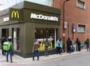 Delivery riders queue up outside a McDonald's restaurant in east London after the restaurant opened for delivery only orders (Photo: DANIEL LEAL-OLIVAS/AFP via Getty Images)