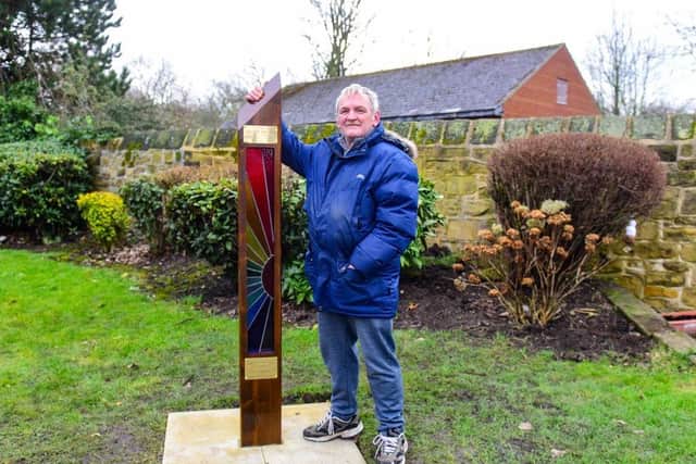Chairman of Friends of Hebburn Cemetery, John Stewart with the memorial paying tribute to the victims of the pandemic.