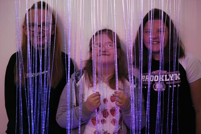 Epinay School pupils Jessie Linsley, Gracie Ellison and Ava Marley in the sensory room.