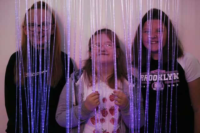 Epinay School pupils Jessie Linsley, Gracie Ellison and Ava Marley in the sensory room.