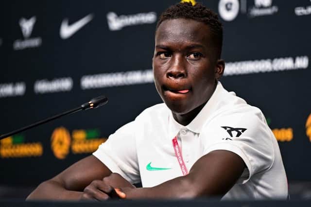 Australia's Garang Kuol attends a press conference at the Aspire Academy in Doha.