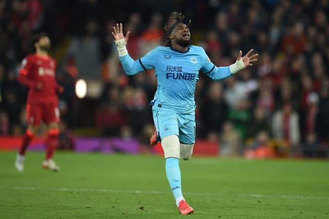 Newcastle United's French midfielder Allan Saint-Maximin reacts during the English Premier League football match between Liverpool and Newcastle United at Anfield in Liverpool, north west England on December 16, 2021. (Photo by OLI SCARFF/AFP via Getty Images)