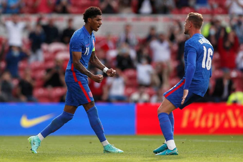 Marcus Rashford of England celebrates after scoring from the penalty spot.