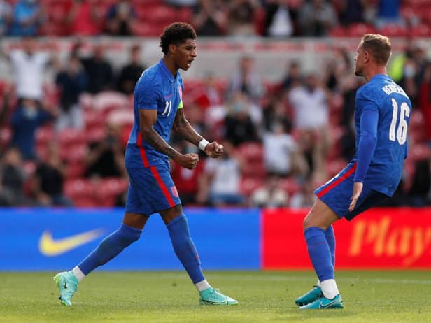 Marcus Rashford of England celebrates after scoring from the penalty spot.