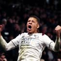 Dwight Gayle celebrates a goal for Derby. (Photo by Naomi Baker/Getty Images).