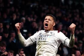 Dwight Gayle celebrates a goal for Derby. (Photo by Naomi Baker/Getty Images).