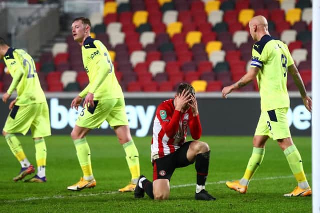 Sergi Canos of Brentford reacts after a missed chance.