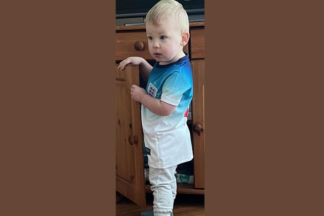 Noah, age 1, kitted out for the big match.