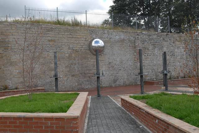 The La Strada nightclub, now demolished, is remembered in a small garden with club-themed public artworks in Commercial Road.