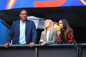 LE HAVRE, FRANCE - JUNE 14: Dion Dublin, Jordan Nobbs and Alex Scott look on from the TV studio during the 2019 FIFA Women's World Cup France group D match between England and Argentina at  on June 14, 2019 in Le Havre, France. (Photo by Marc Atkins/Getty Images)