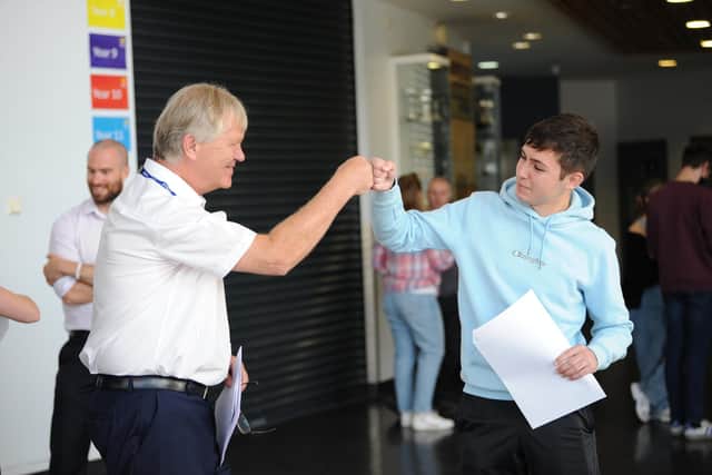 Harton Academy Sixth Form student Jack Johnston with executive head teacher Sir Ken Gibson.