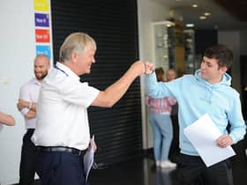 Harton Academy Sixth Form student Jack Johnston with executive head teacher Sir Ken Gibson.