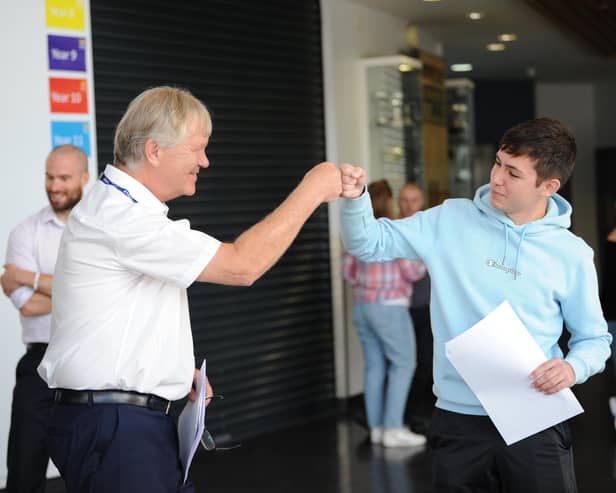 Harton Academy Sixth Form student Jack Johnston with executive head teacher Sir Ken Gibson.