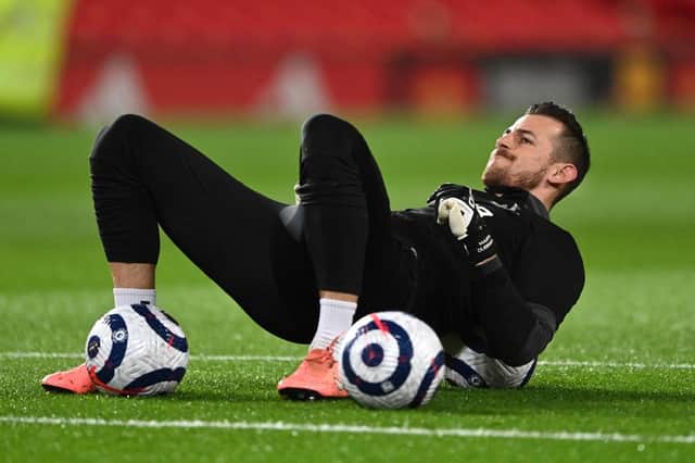 MANCHESTER, ENGLAND - FEBRUARY 21: Martin Dubravka of Newcastle United warms up prior to the Premier League match between Manchester United and Newcastle United at Old Trafford on February 21, 2021 in Manchester, England. Sporting stadiums around the UK remain under strict restrictions due to the Coronavirus Pandemic as Government social distancing laws prohibit fans inside venues resulting in games being played behind closed doors. (Photo by Stu Forster/Getty Images)