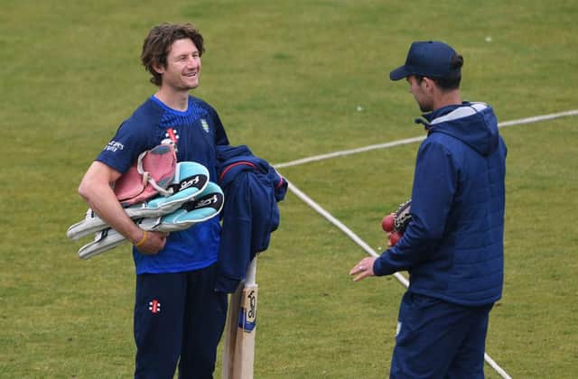 Durham batsman Cameron Bancroft (l) chats with coach James Franklin after a net session.