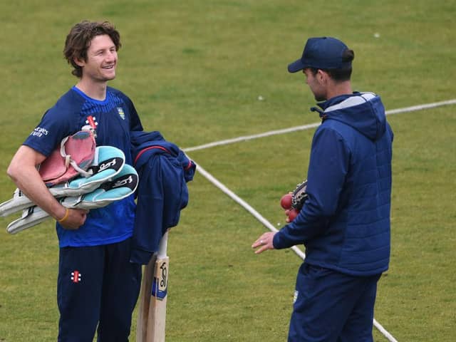 Durham batsman Cameron Bancroft (l) chats with coach James Franklin after a net session.