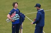 Durham batsman Cameron Bancroft (l) chats with coach James Franklin after a net session.
