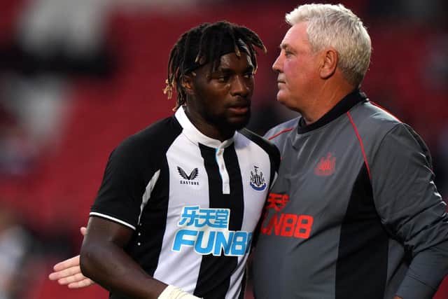 Newcastle United's Allan Saint-Maximin and manager Steve Bruce during the pre-season friendly match at the Keepmoat Stadium, Doncaster. Picture date: Friday July 23, 2021.
