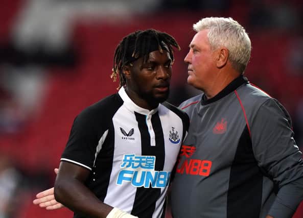 Newcastle United's Allan Saint-Maximin and manager Steve Bruce during the pre-season friendly match at the Keepmoat Stadium, Doncaster. Picture date: Friday July 23, 2021.