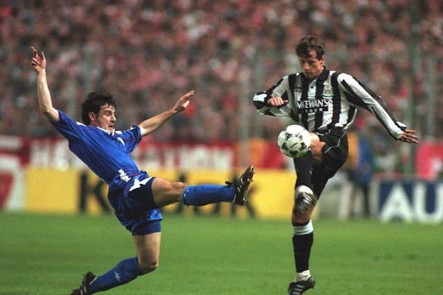SCOTT SELLARS OF NEWCASTLE IS TACKLED BY LARRAINZAR OF BILBAO  DURING THE ATHLETICO BILBAO V NEWCASTLE UNITED UEFA CUP SECOND ROUND SECOND LEG MATCH IN BILBAO, SPAIN. Mandatory Credit: Chris Cole/ALLSPORT
