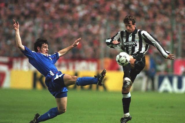 SCOTT SELLARS OF NEWCASTLE IS TACKLED BY LARRAINZAR OF BILBAO DURING THE ATHLETICO BILBAO V NEWCASTLE UNITED UEFA CUP SECOND ROUND SECOND LEG MATCH IN BILBAO, SPAIN. Mandatory Credit: Chris Cole/ALLSPORT