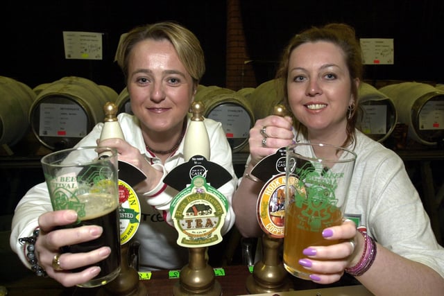 "2001 A Beer Oddity" -14th Wigan Beer Festival at The Mill at The Pier, Wigan Pier.
PULL THE OTHER ONE...Sisters Alison, left, and Tracey Webster keep the ale flowing