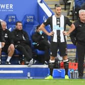 Andy Carroll of Newcastle United waits to be substituted on as Steve Bruce, Manager of Newcastle United looks on during the Premier League match between Leicester City and Newcastle United at The King Power Stadium on September 29, 2019 in Leicester, United Kingdom. (Photo by Michael Regan/Getty Images)