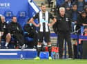 Andy Carroll of Newcastle United waits to be substituted on as Steve Bruce, Manager of Newcastle United looks on during the Premier League match between Leicester City and Newcastle United at The King Power Stadium on September 29, 2019 in Leicester, United Kingdom. (Photo by Michael Regan/Getty Images)